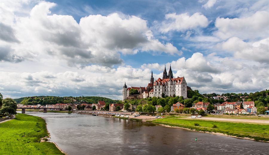 Castle above a quiet river